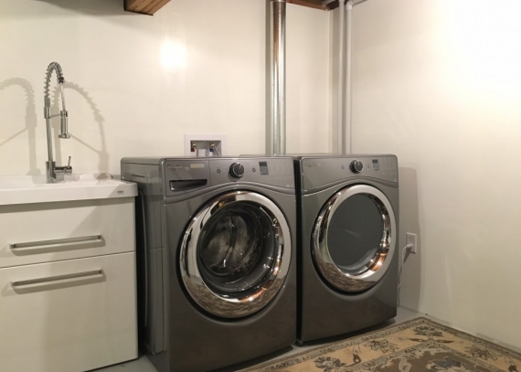 Transforming an unused basement into a new laundry room